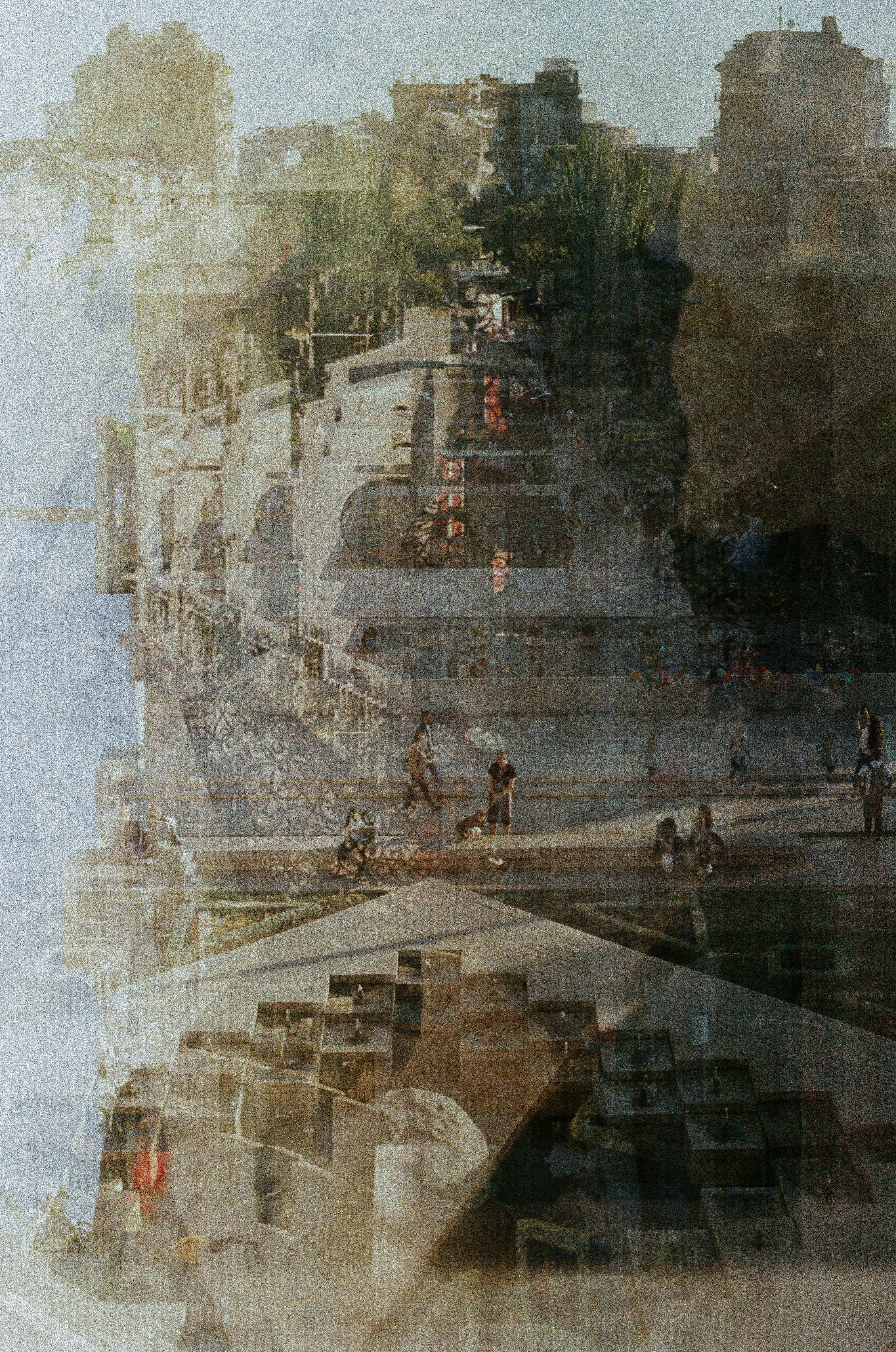 a blurry photo of a city street with people walking