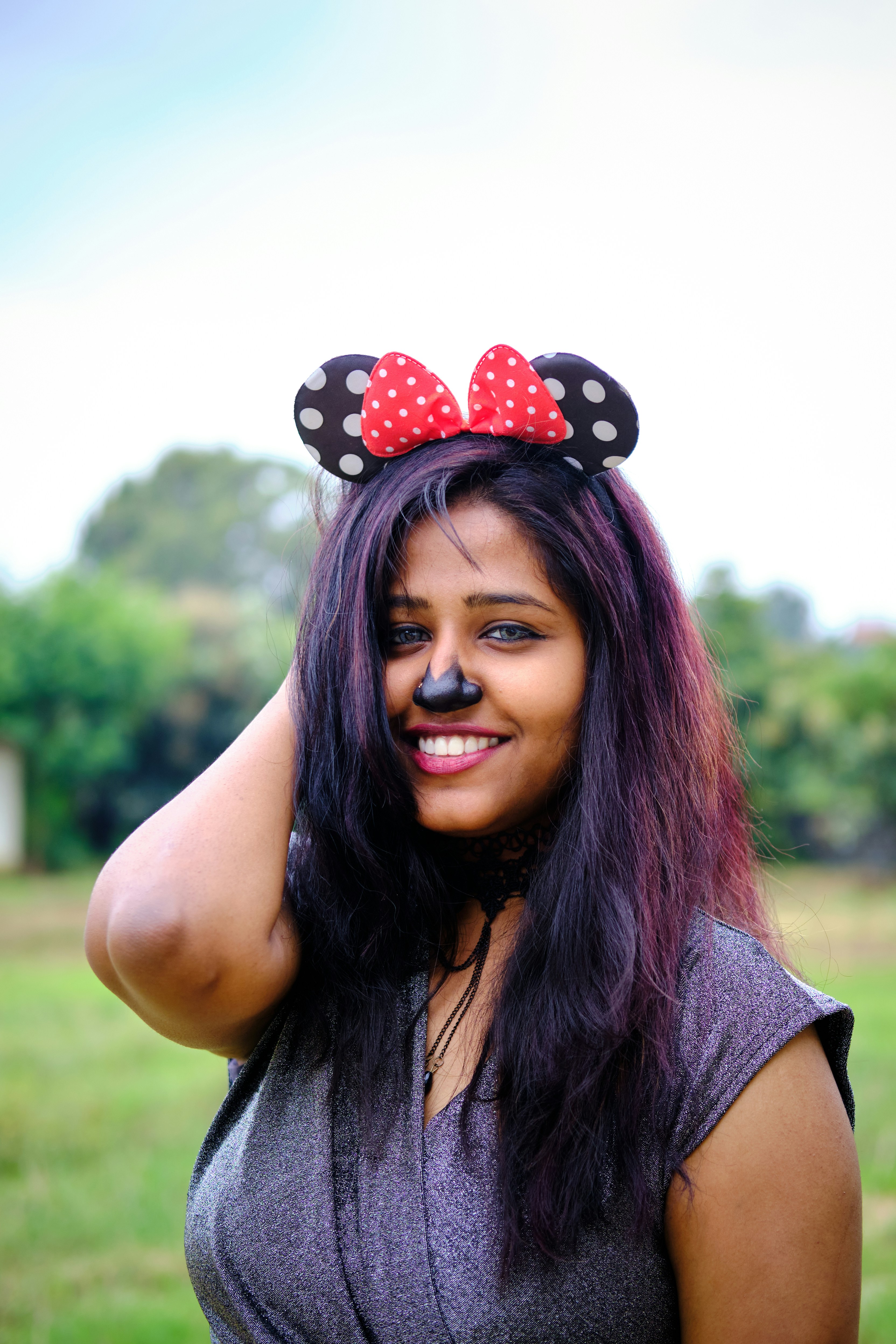 a woman with a minnie mouse ears on her head
