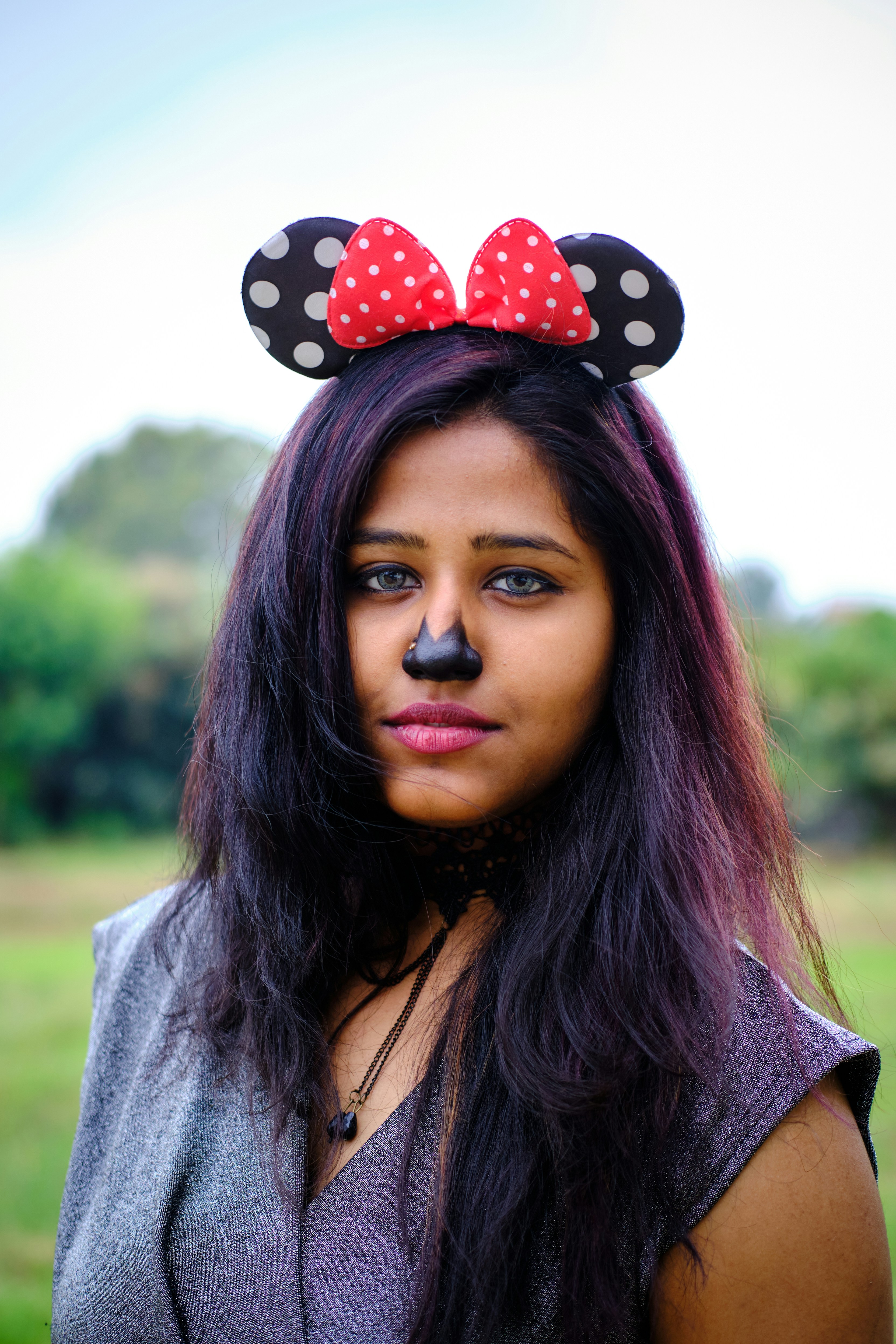 a woman with a minnie mouse ears on her head