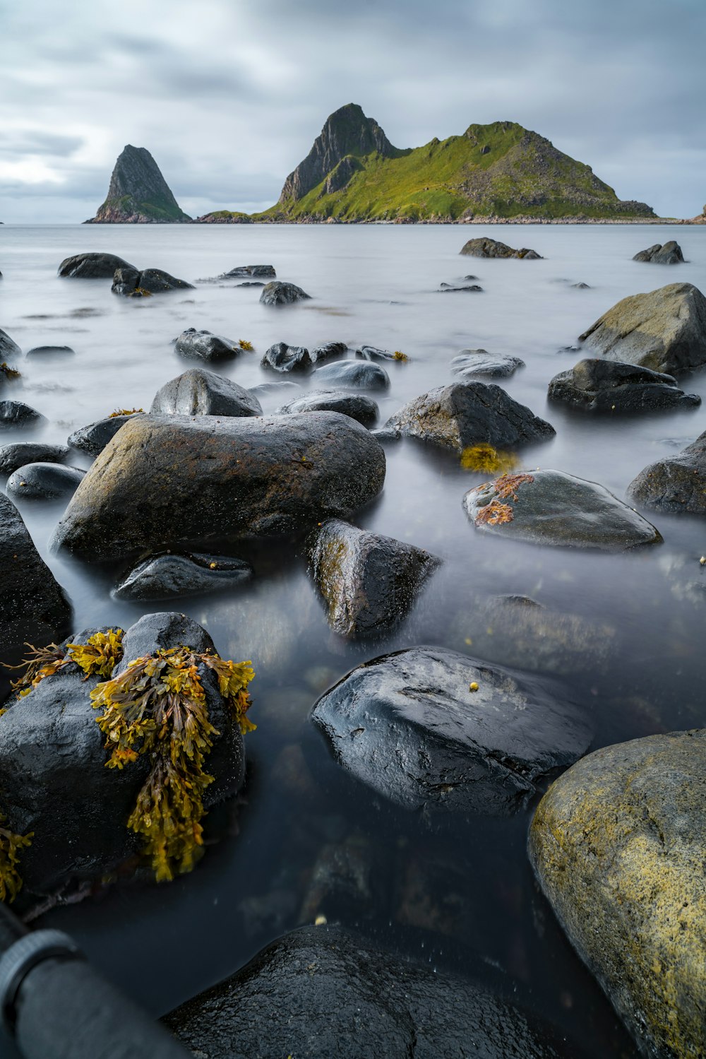 a bunch of rocks that are in the water