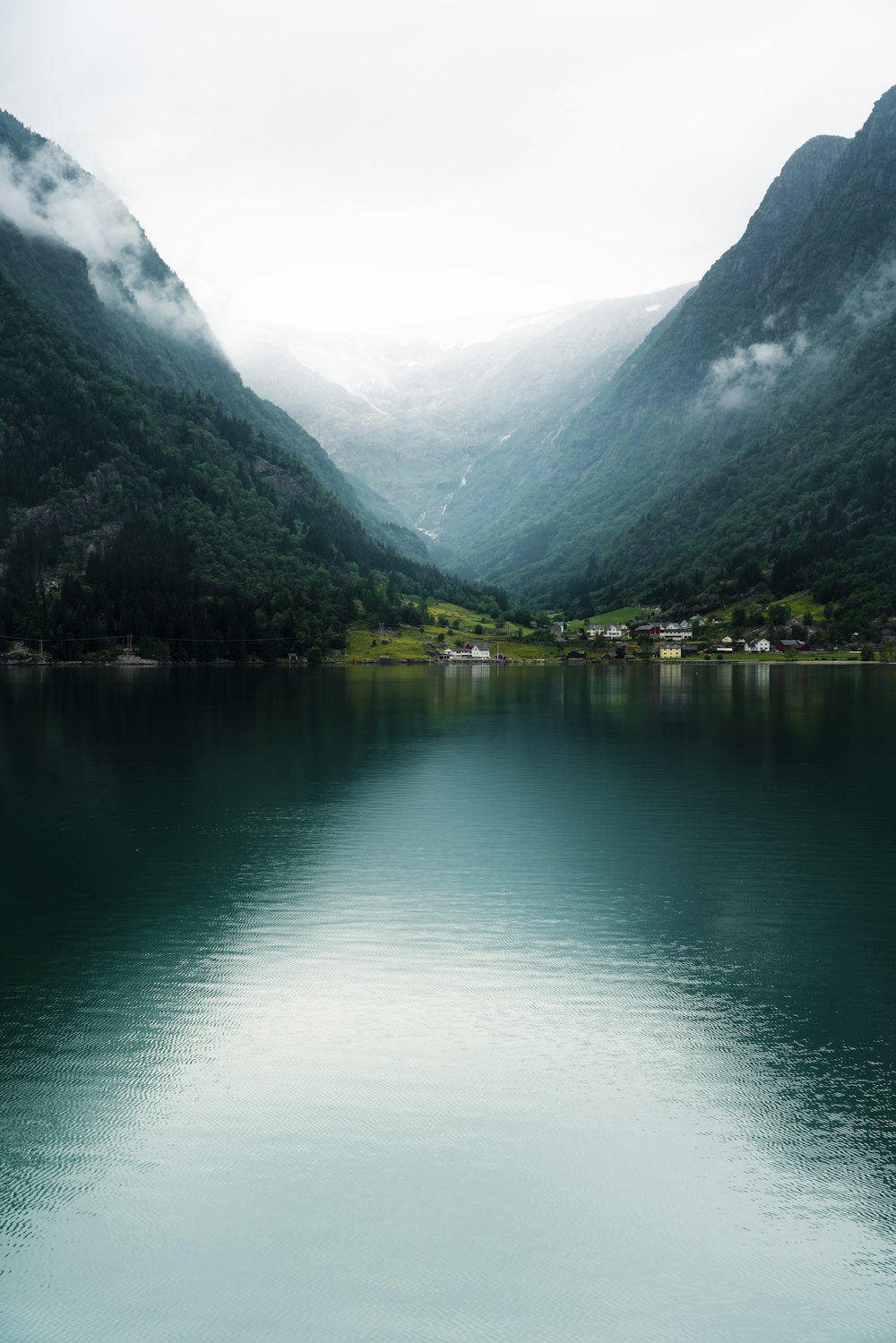 a large body of water surrounded by mountains