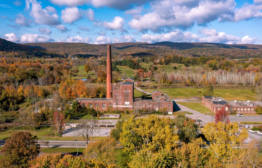 an aerial view of a factory in the fall