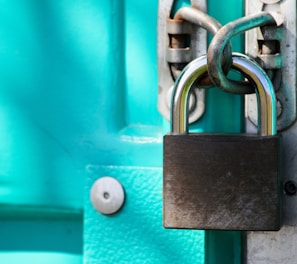 a close up of a padlock on a door