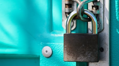 a close up of a padlock on a door