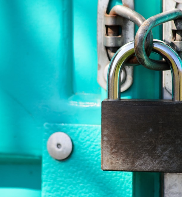 a close up of a padlock on a door