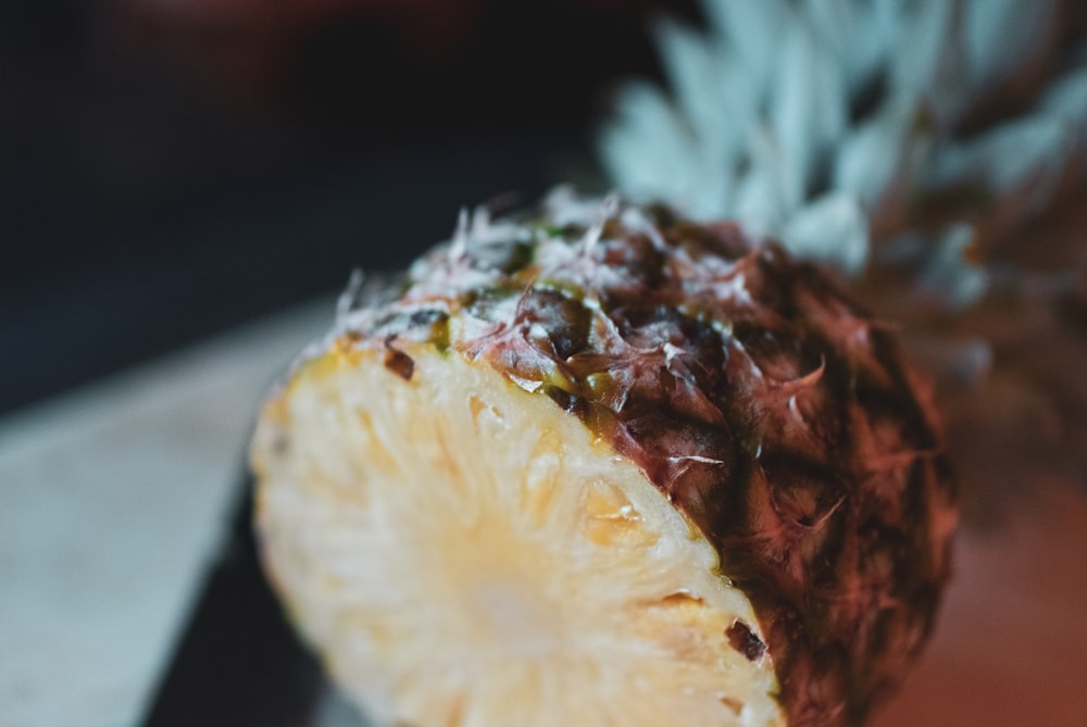 a close up of a piece of fruit on a plate