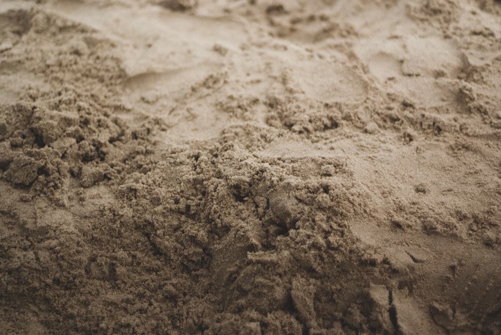 a close up of a pile of sand