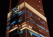 a very tall building lit up at night