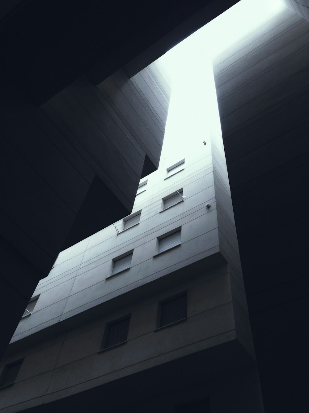 a tall building with a skylight above it