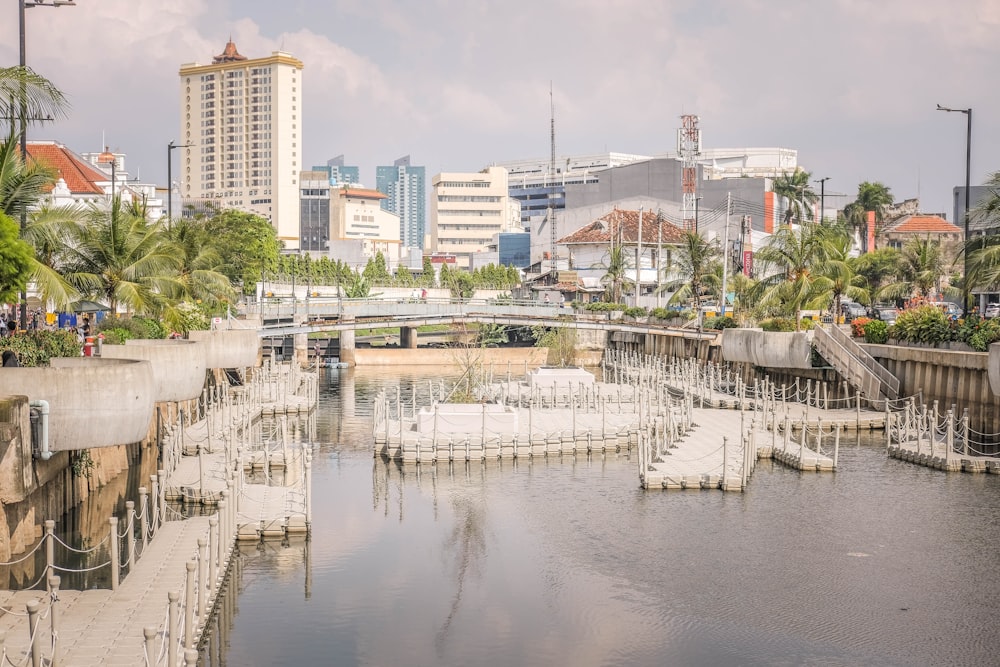 a body of water with a bridge in the background