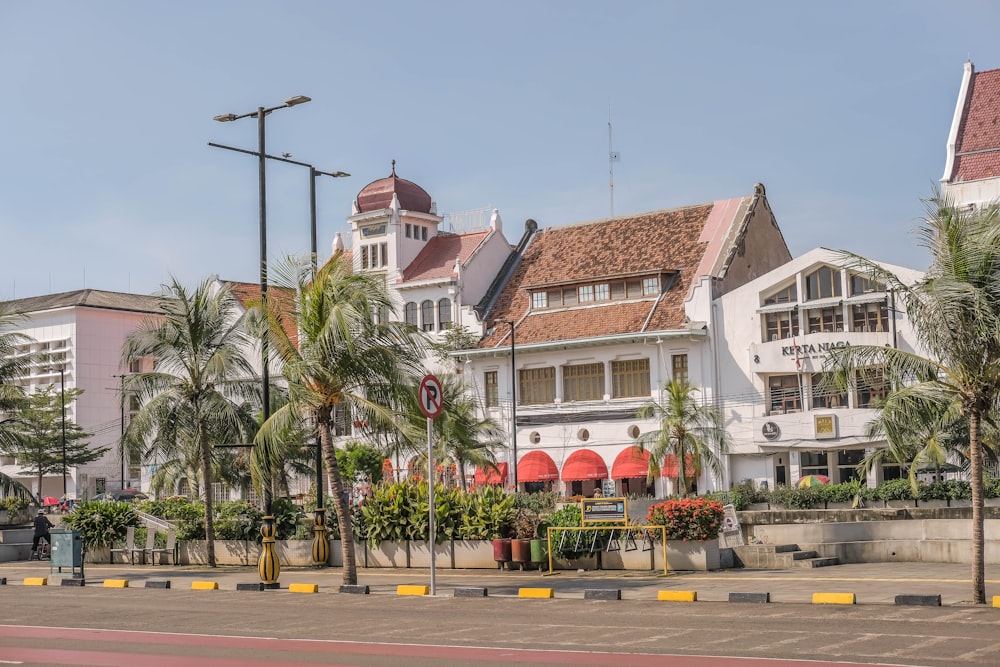 a large white building with a clock tower on top of it