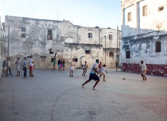 a group of people playing a game of basketball