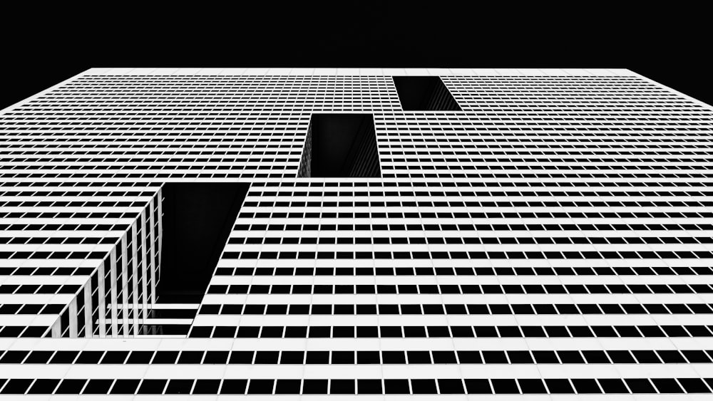 a black and white photo of a tall building