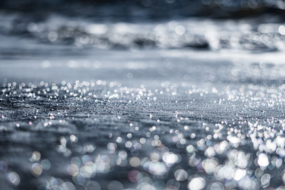 a black and white photo of water and bubbles