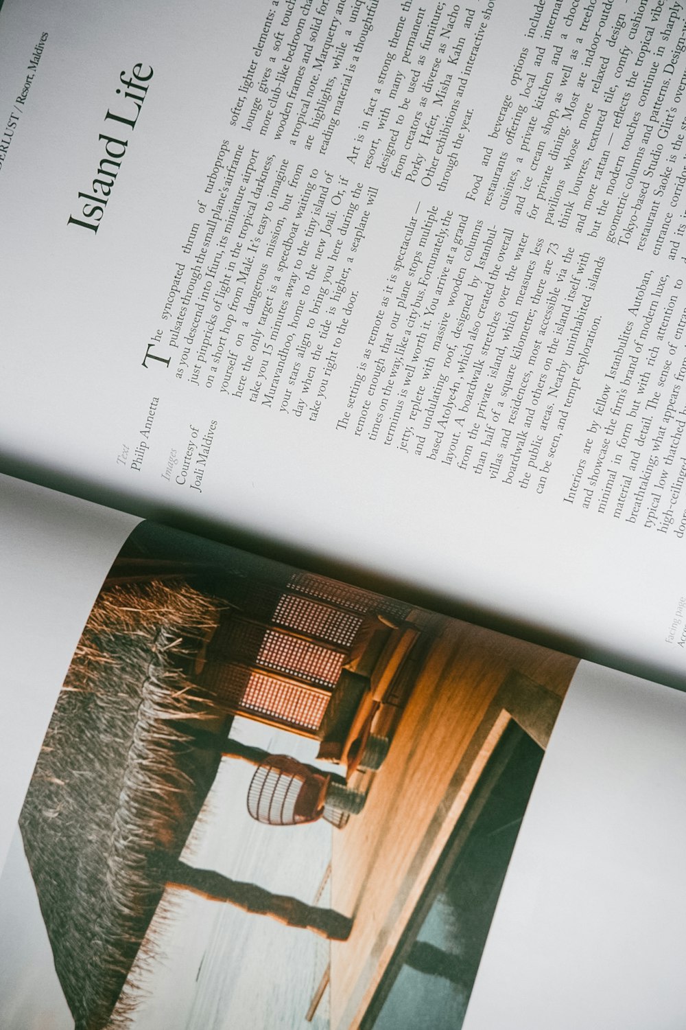 an open book with a picture of a chair