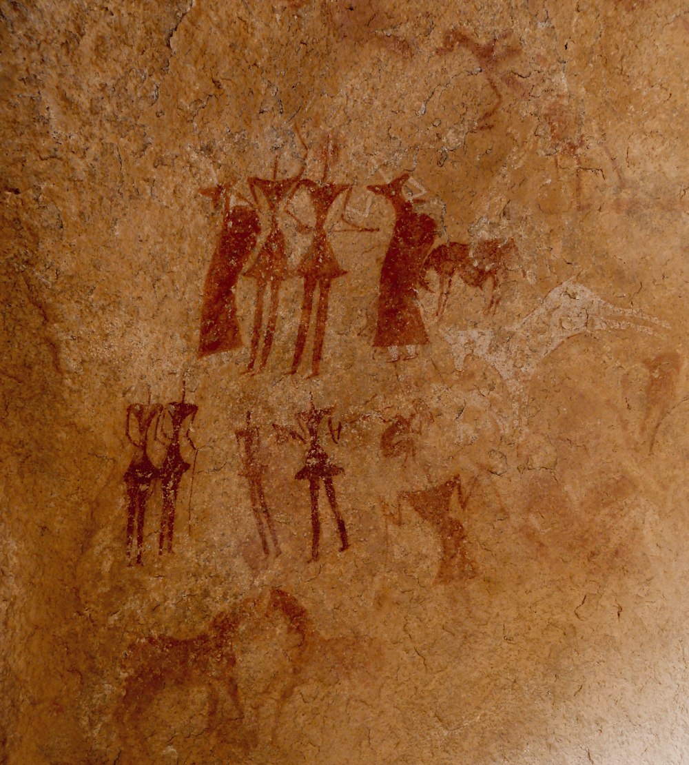 a picture of a group of people on a rock