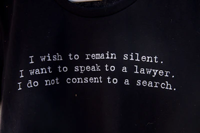 a black t - shirt with a poem written on it