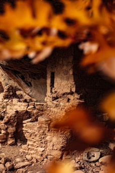 A mysterious ancient megalithic stone structure bathed in soft dawn light.