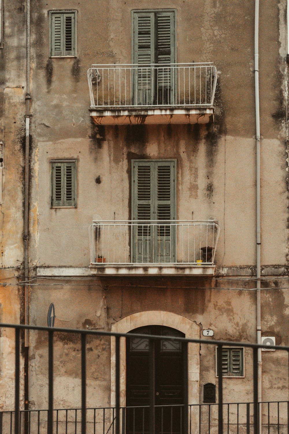 an old building with balconies and balconies on the balconies