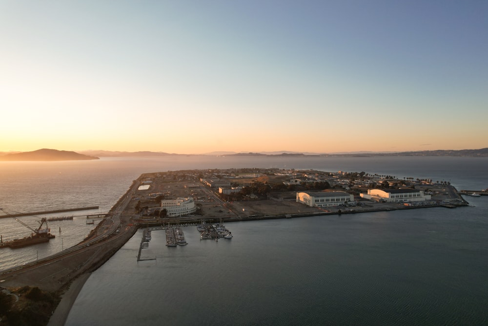 a large body of water with a city in the background