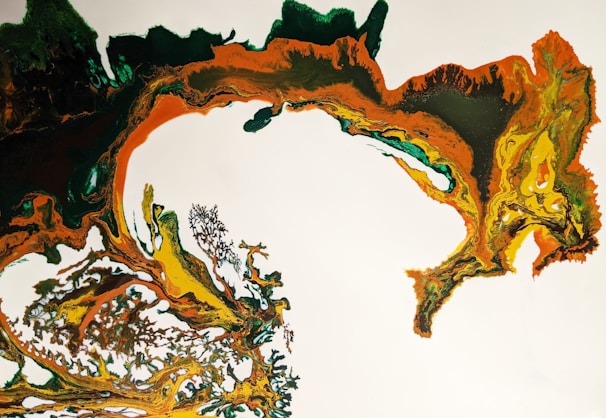 An abstract acrylic canvas featuring swirling patterns of green, yellow, and orange.