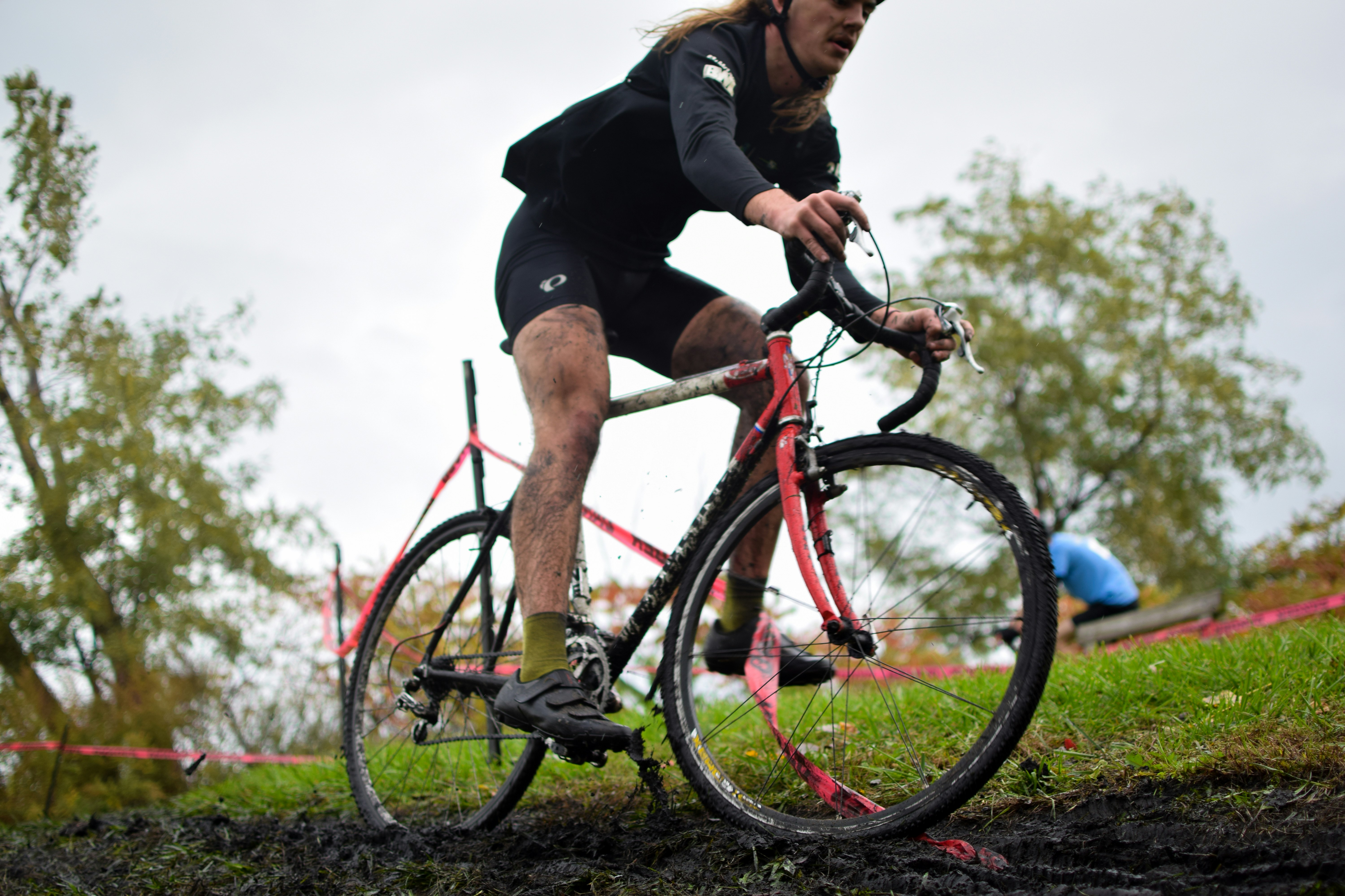 a man riding on the back of a bicycle
