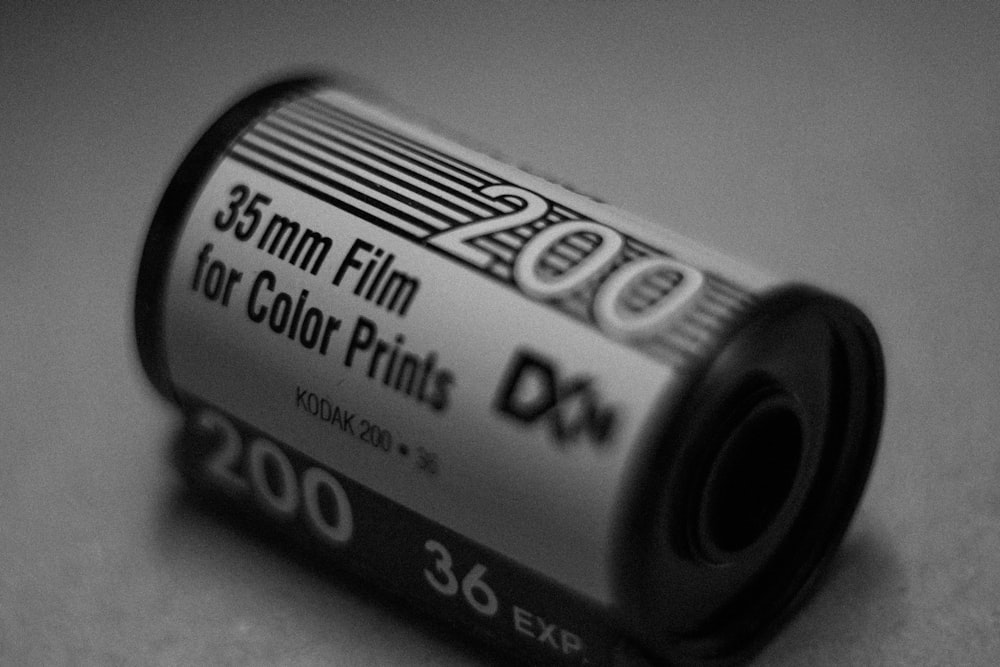 a black and white photo of a roll of film