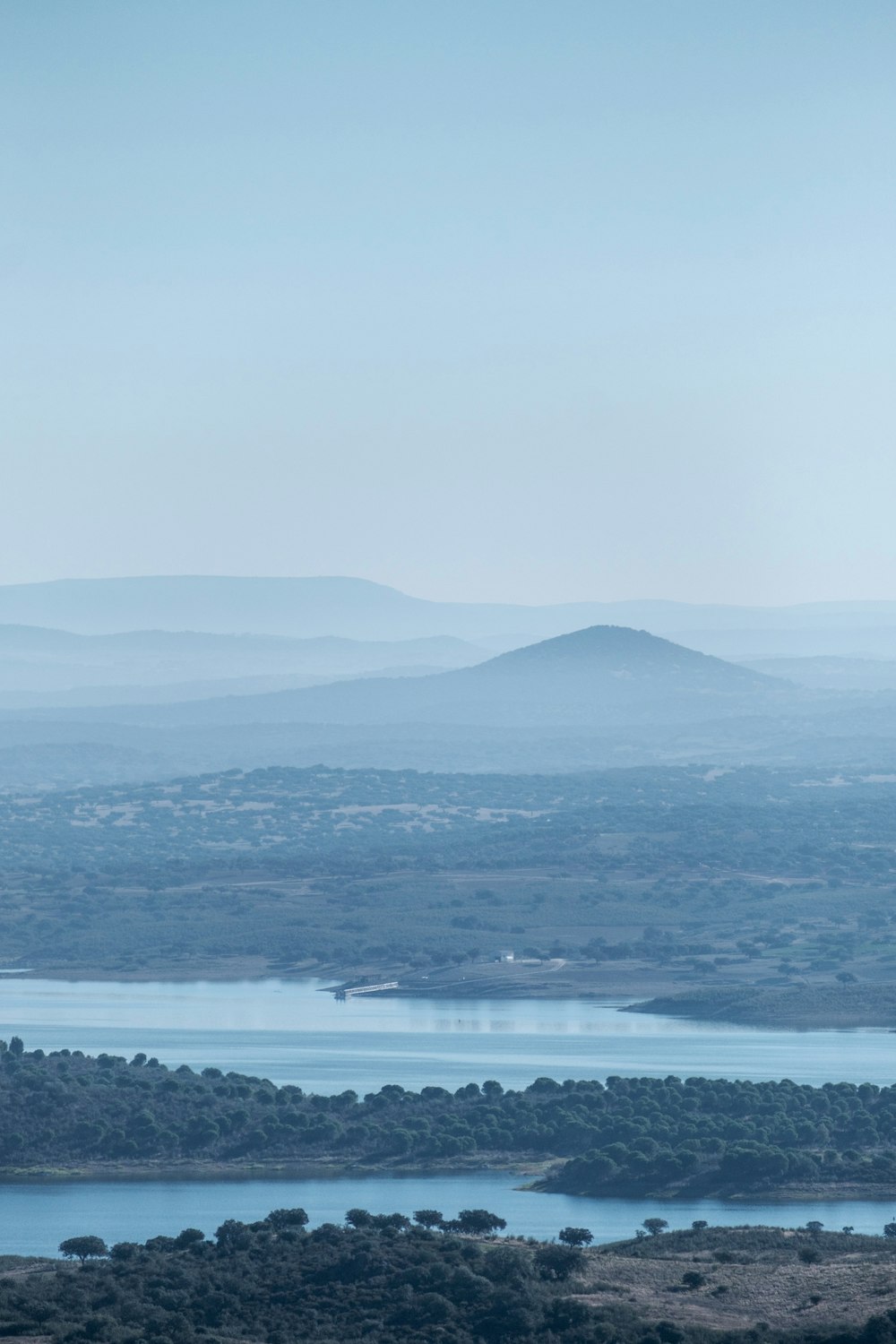 a large body of water surrounded by mountains