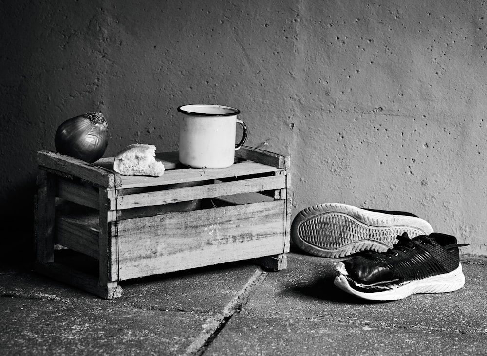 a black and white photo of a pair of shoes