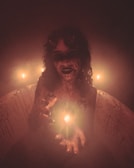 A menacing figure of the Lipstick-Face Demon looming behind a misty veil.