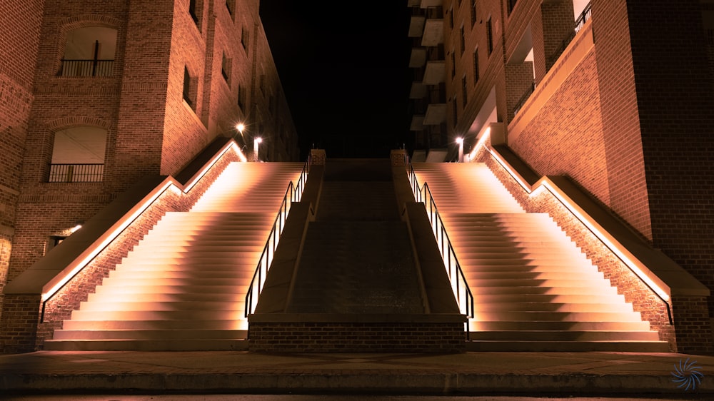 a set of stairs lit up at night