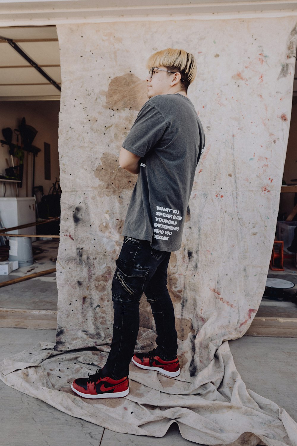 a man standing on top of a piece of paper