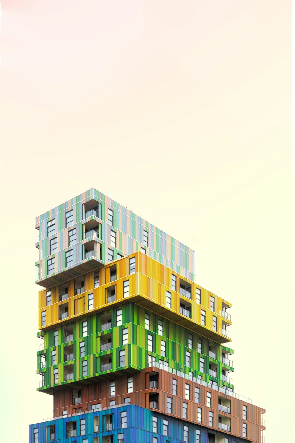 a multi - colored building is stacked on top of each other