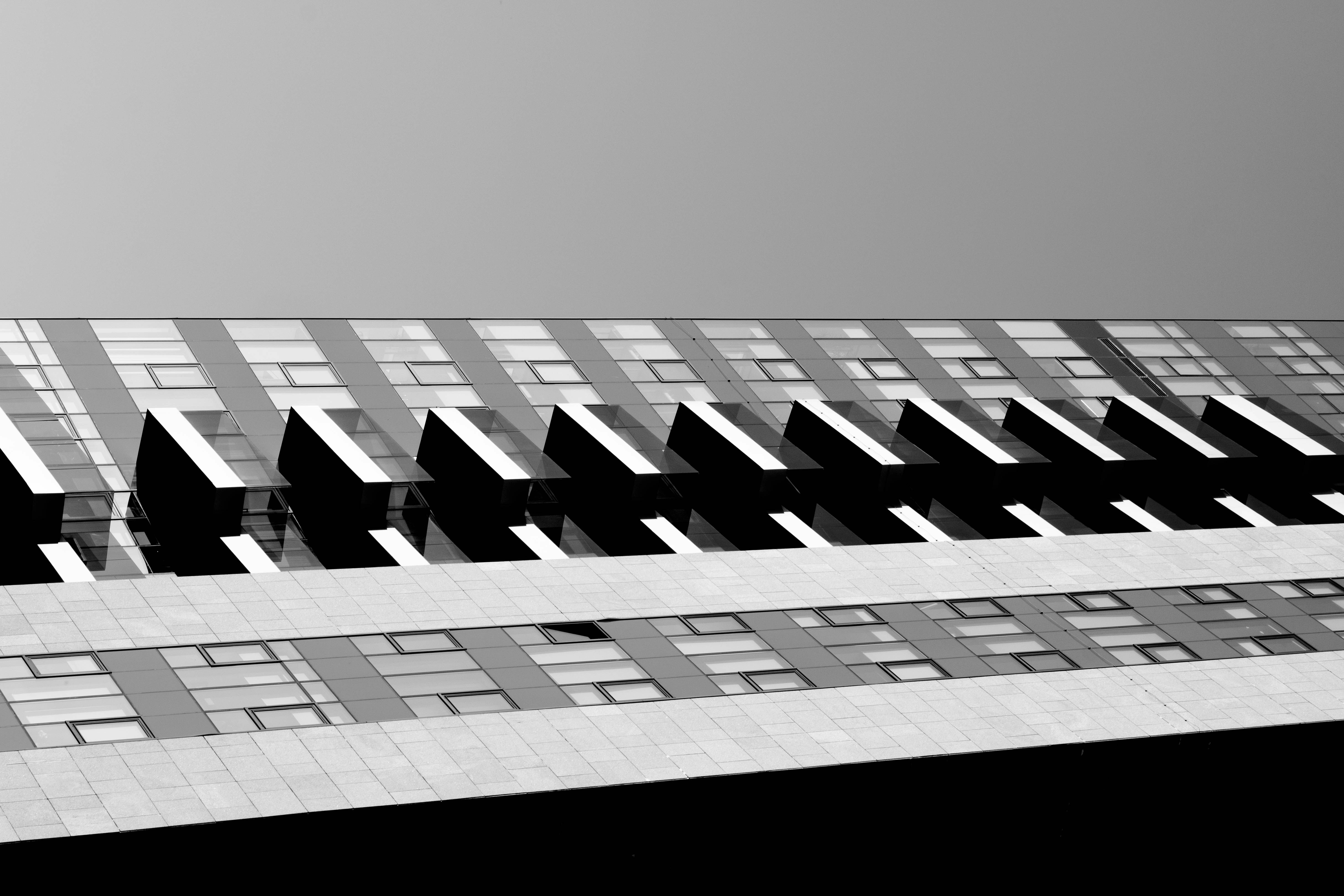 a black and white photo of a tall building