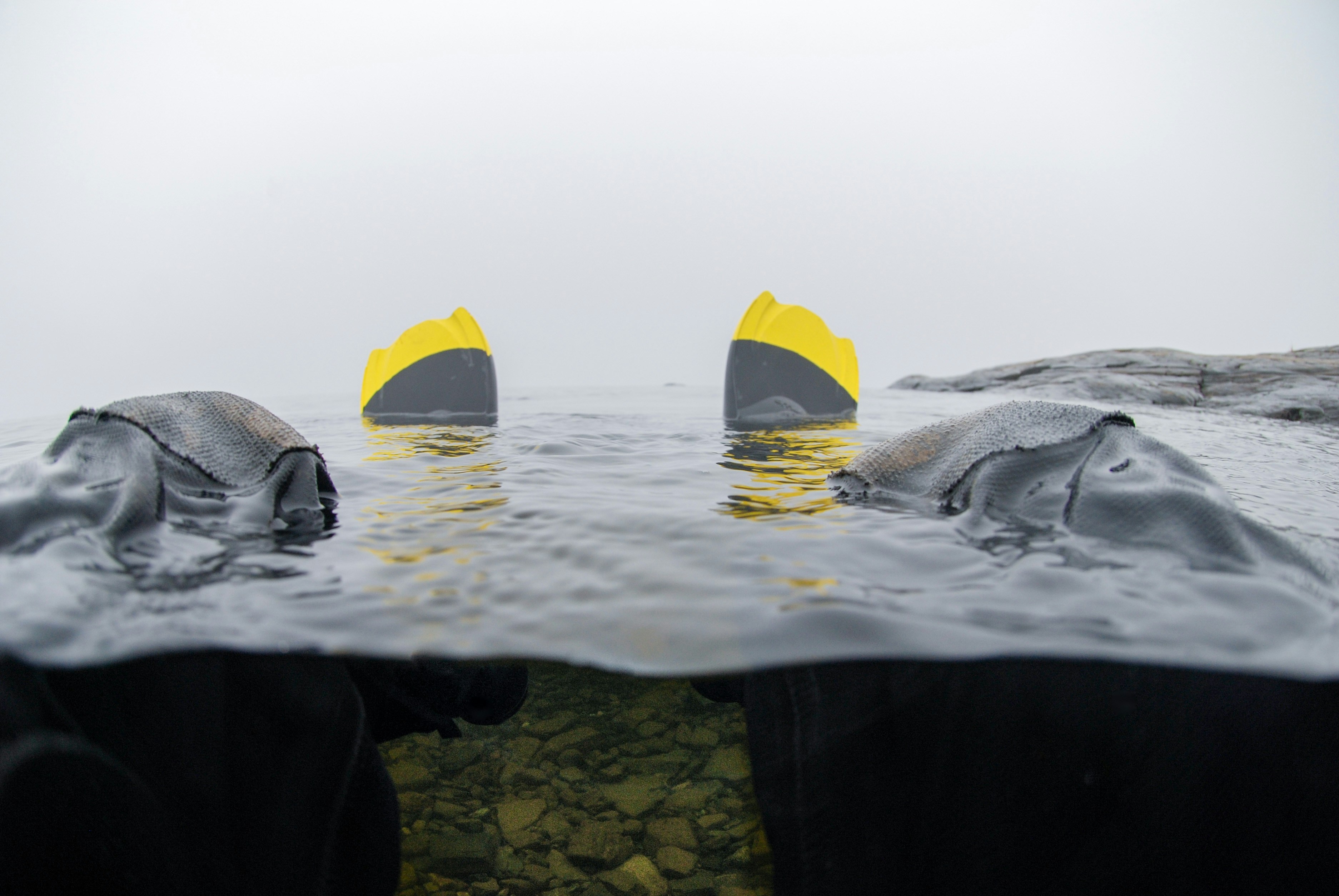 on cloud waterproof shoe submerged in a shallow puddle - on cloud waterproof review