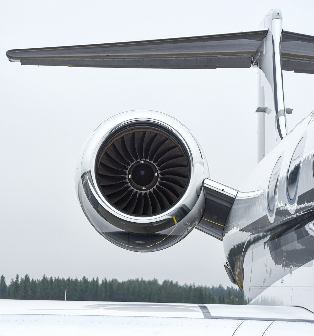 a large jetliner sitting on top of an airport tarmac