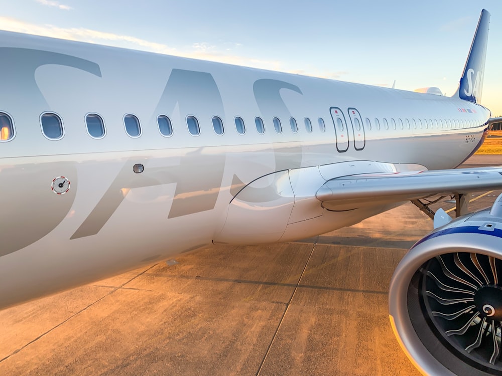 a large jetliner sitting on top of an airport tarmac