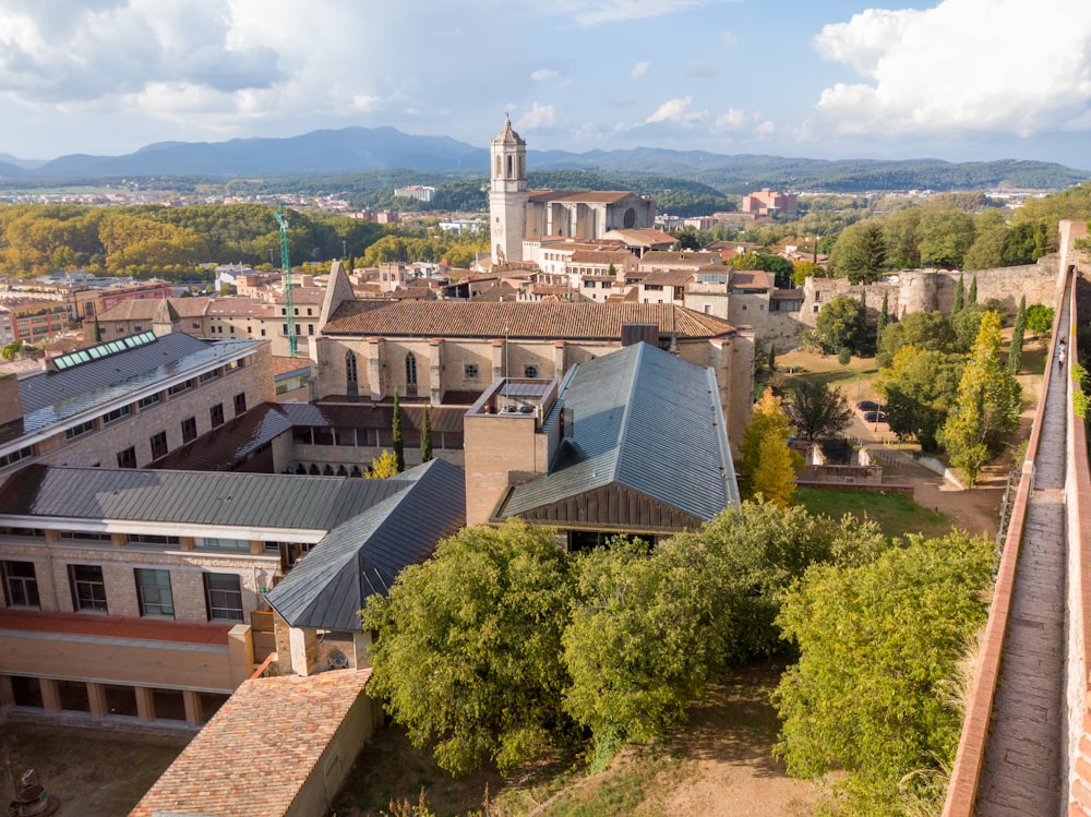 an aerial view of a city with a clock tower