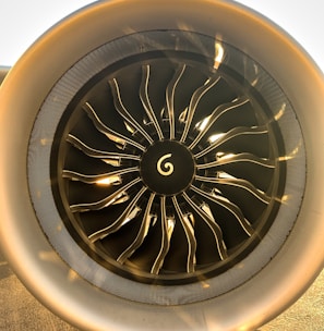 a close up of a jet engine on a runway