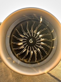 a close up of a jet engine on a runway