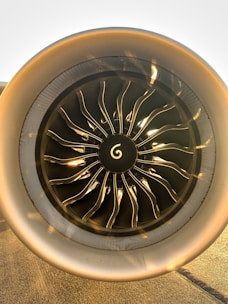a close up of a jet engine on a runway