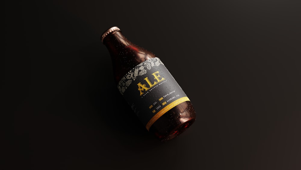 a bottle of ale on a black background