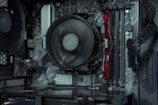 the inside of a computer case with a fan