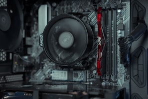 the inside of a computer case with a fan