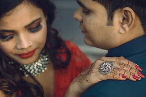 a man and a woman are looking at each other