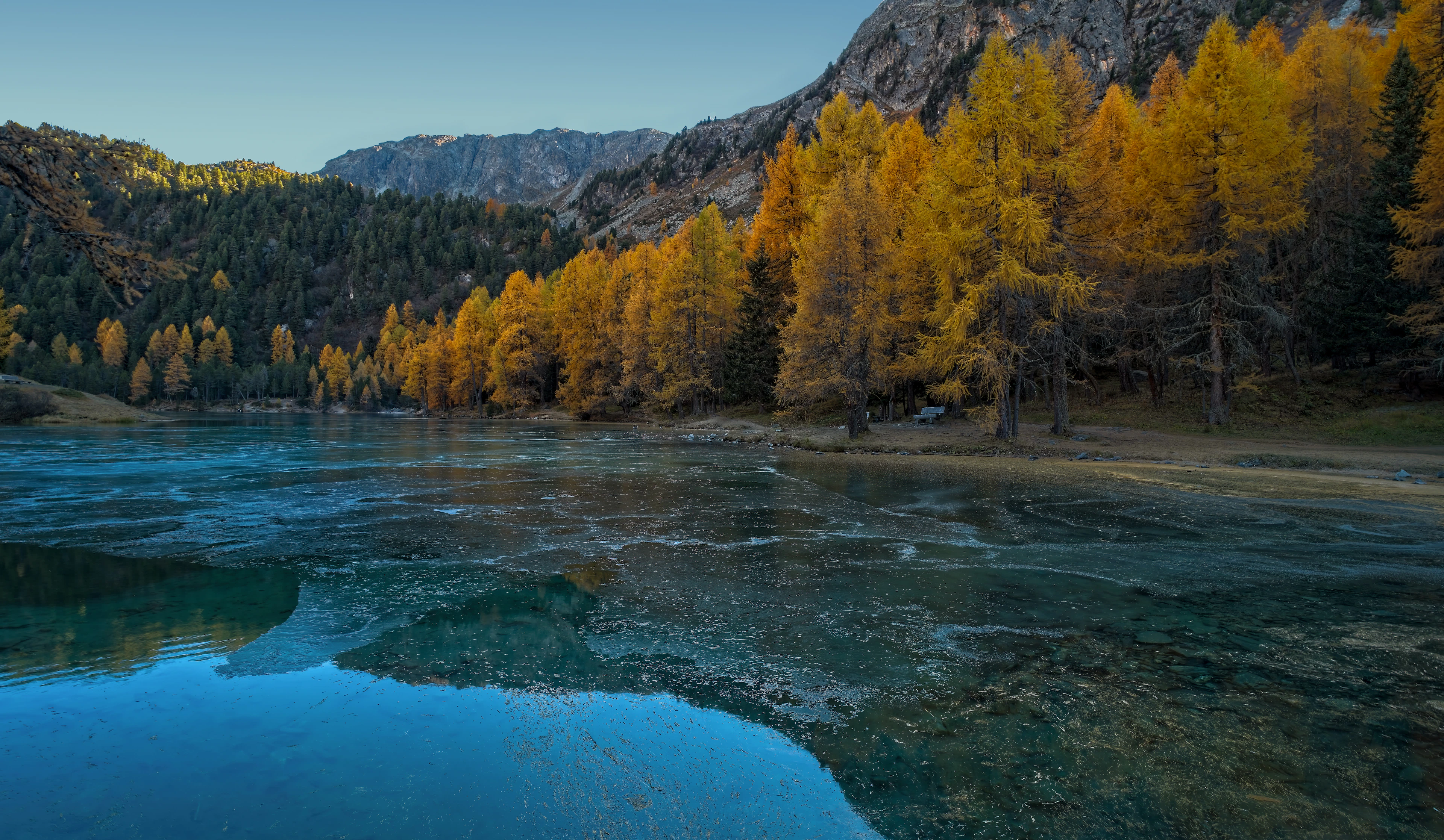 Lai da Palpuogna among golden larches on the Albula pass