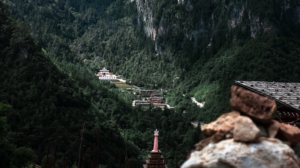 a view of a mountain with a pagoda in the foreground