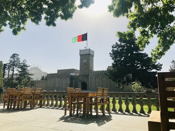 a large building with a flag on top of it