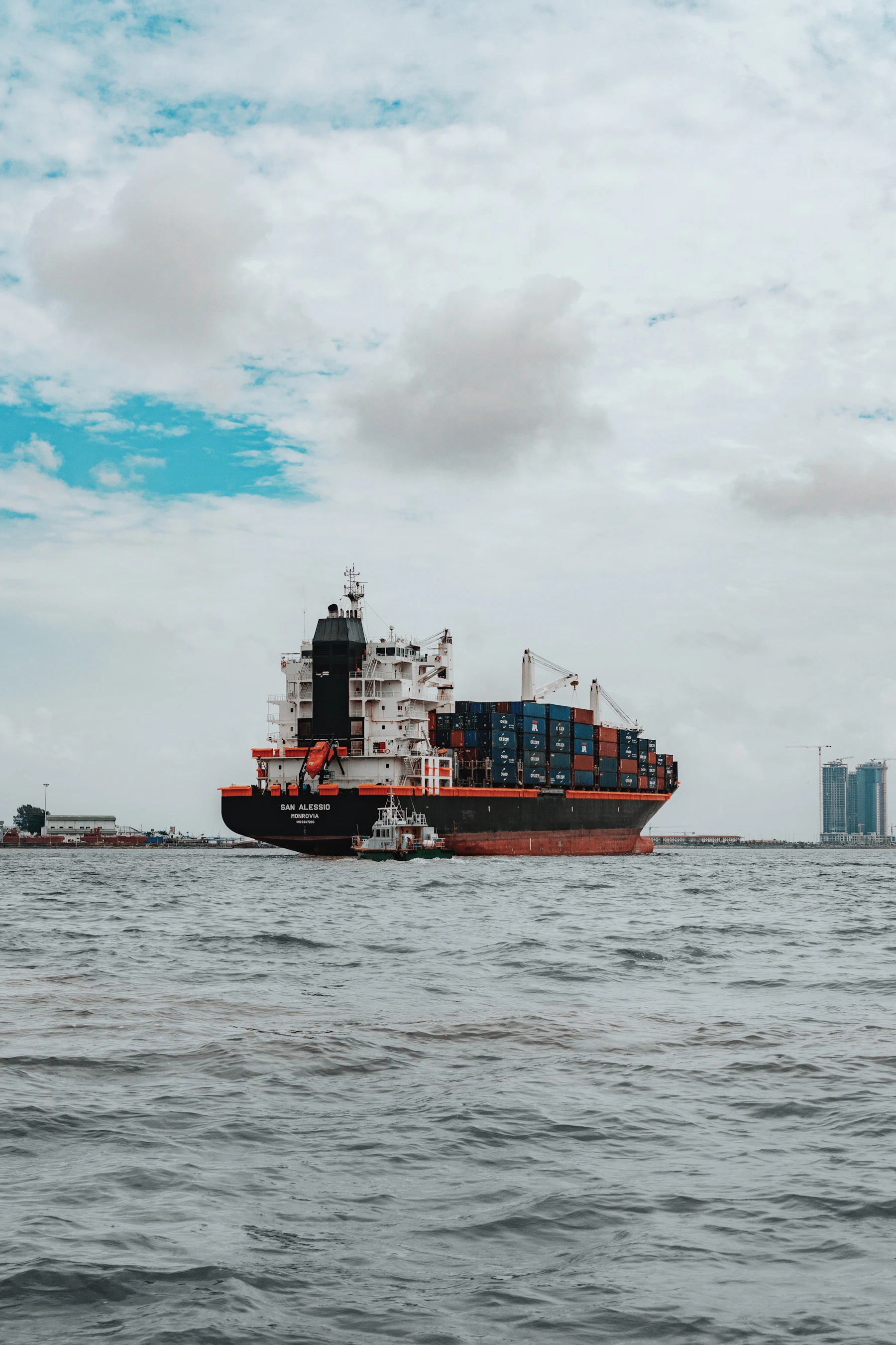 Cargo vessel at sea, representing the maritime industry