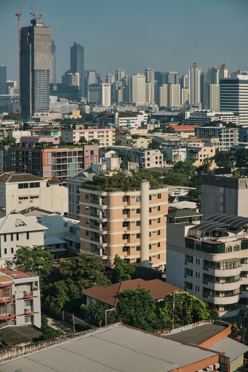 a view of a city with tall buildings